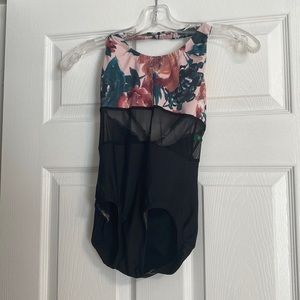 Lucky Leo adult small leotard with floral bodice and sheer center